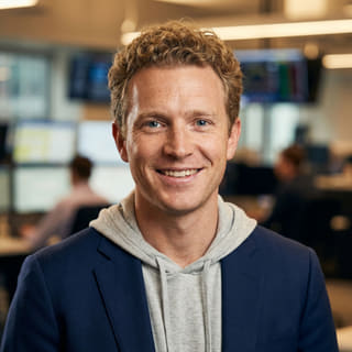 Ryan Brooks, atuando como Analista-Chefe de Trading na Rendívio, foto de perfil